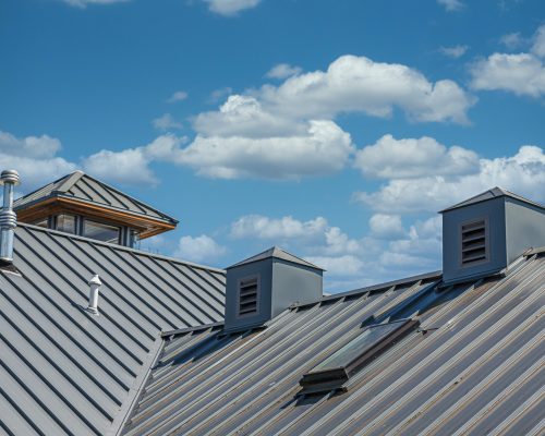 Ribbed Metal Roof Under Blue Skies